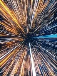 Light-speed streaks representing frequencies delivered at the speed of light